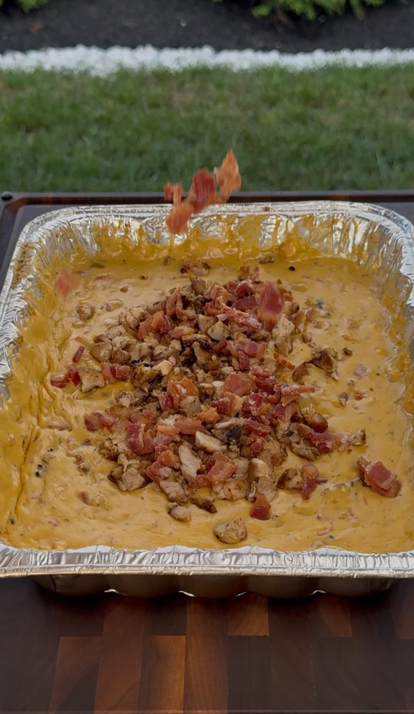 adding the bacon to chicken bacon ranch