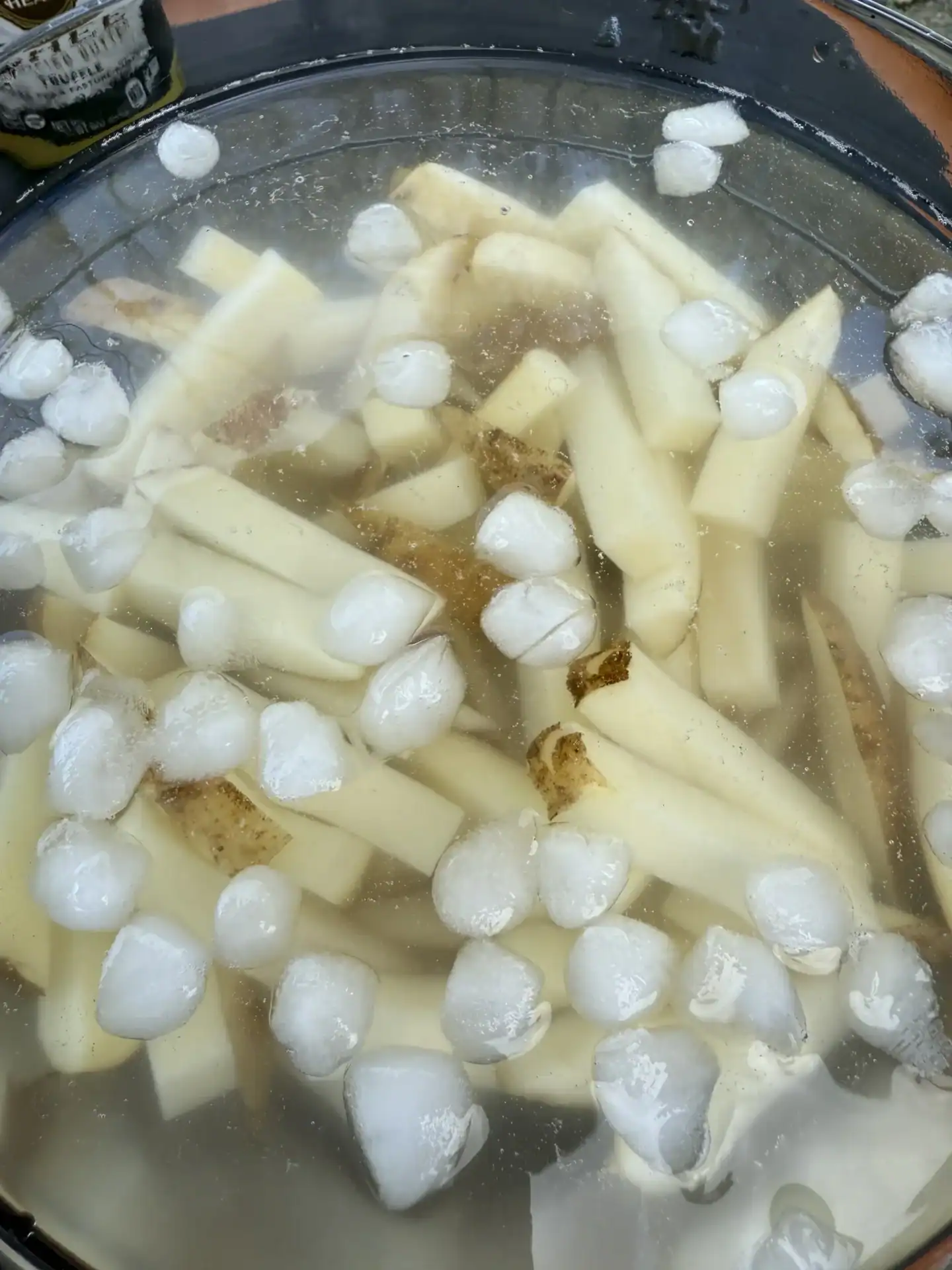 soaked french fries in the bowl with ice