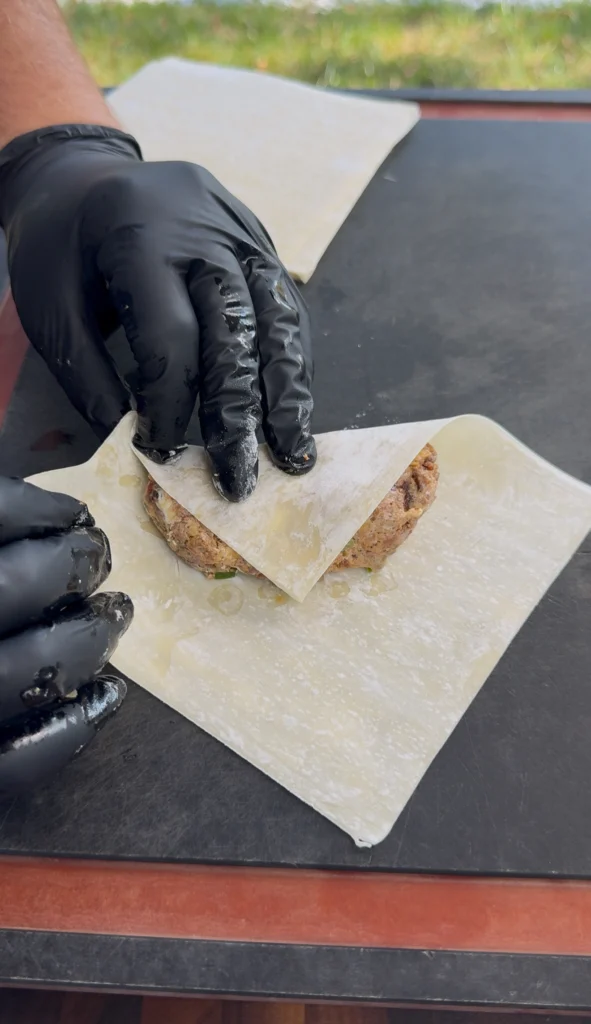 folding the filling with an egg roll