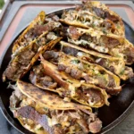 grilled steak tacos plate on the cutting board
