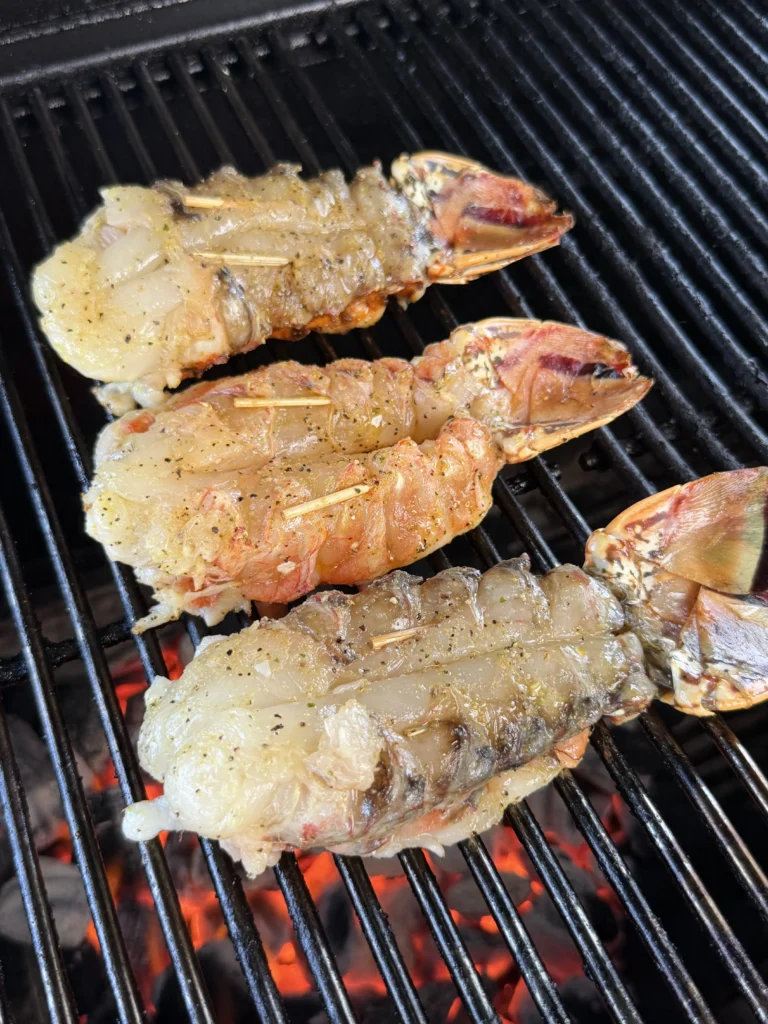 raw lobsters on a grill
