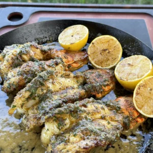 lobster tails in a cast iron