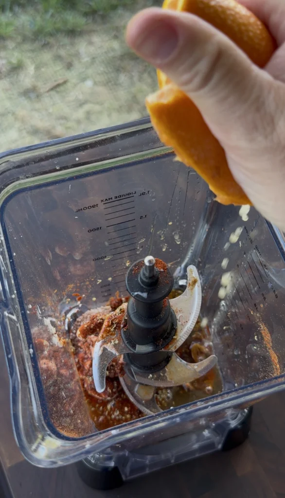 adding orange juice into the sauce