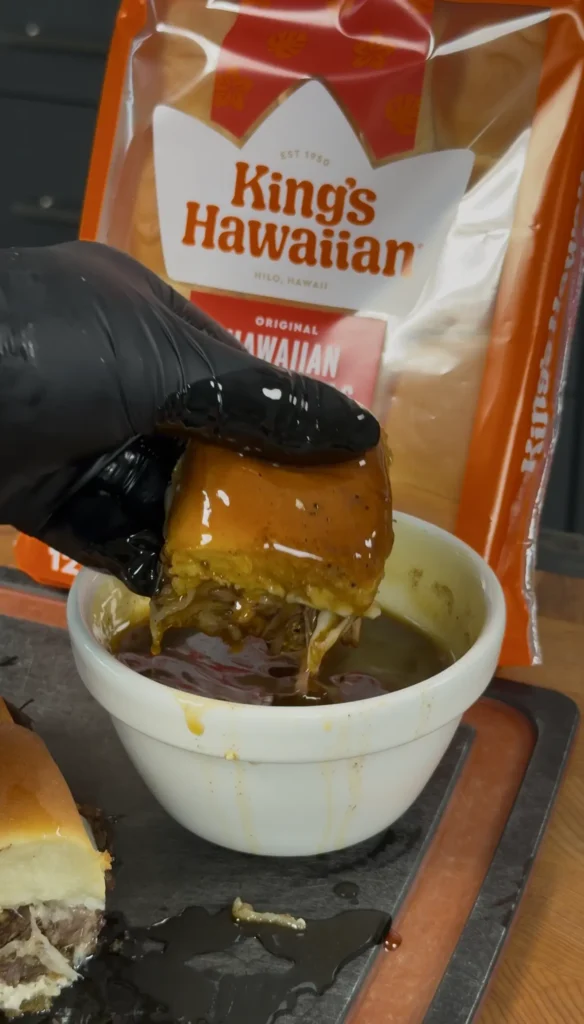 au jus in a cup with a slider