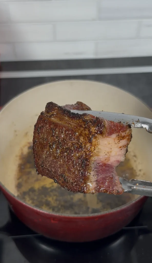 seared chick roast in a dutch oven