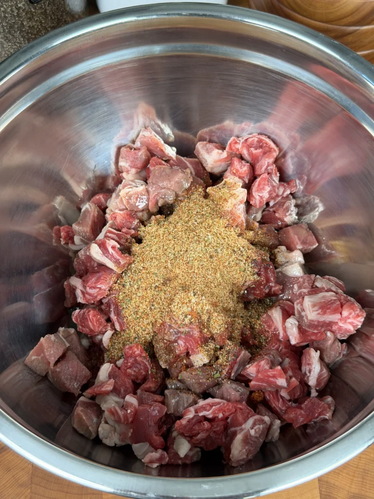 seasoned ribeye in a bowl