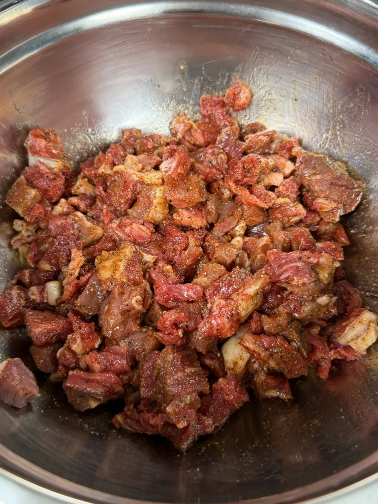 seasoned ribeye in a bowl