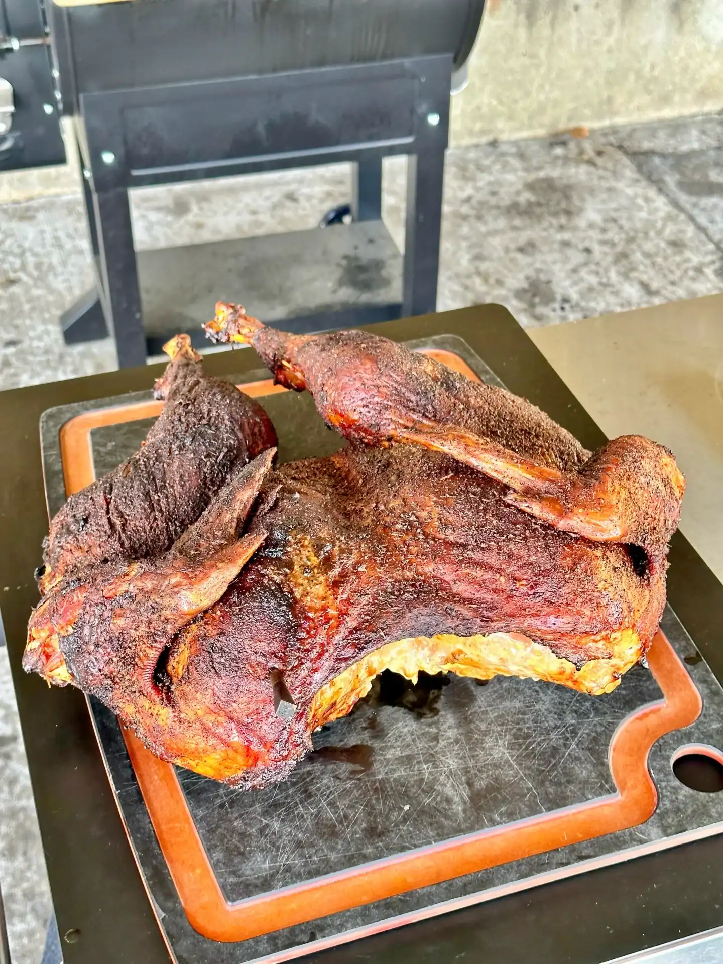 smoked turkey on a cutting board