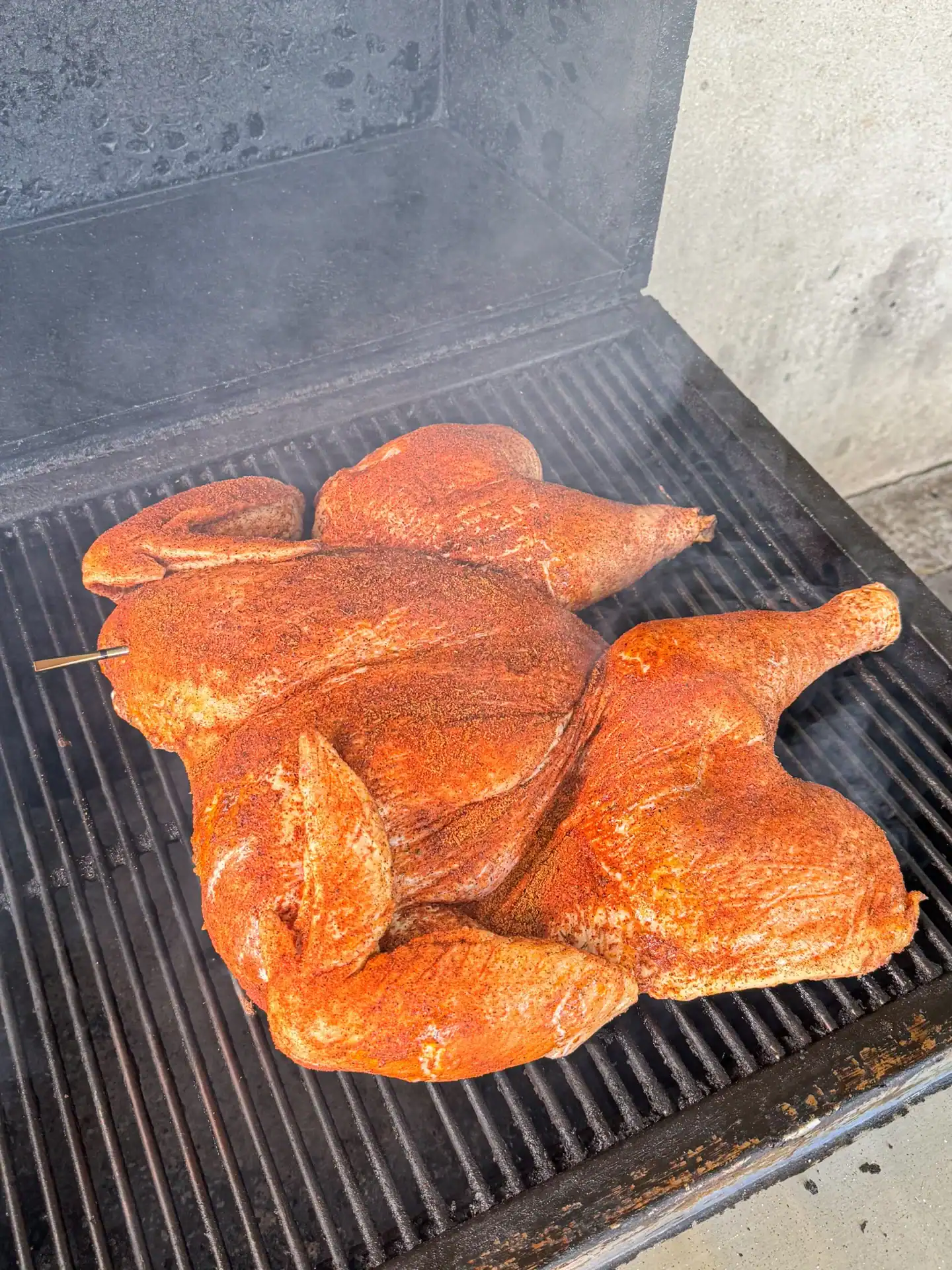 turkey on the grill smoking