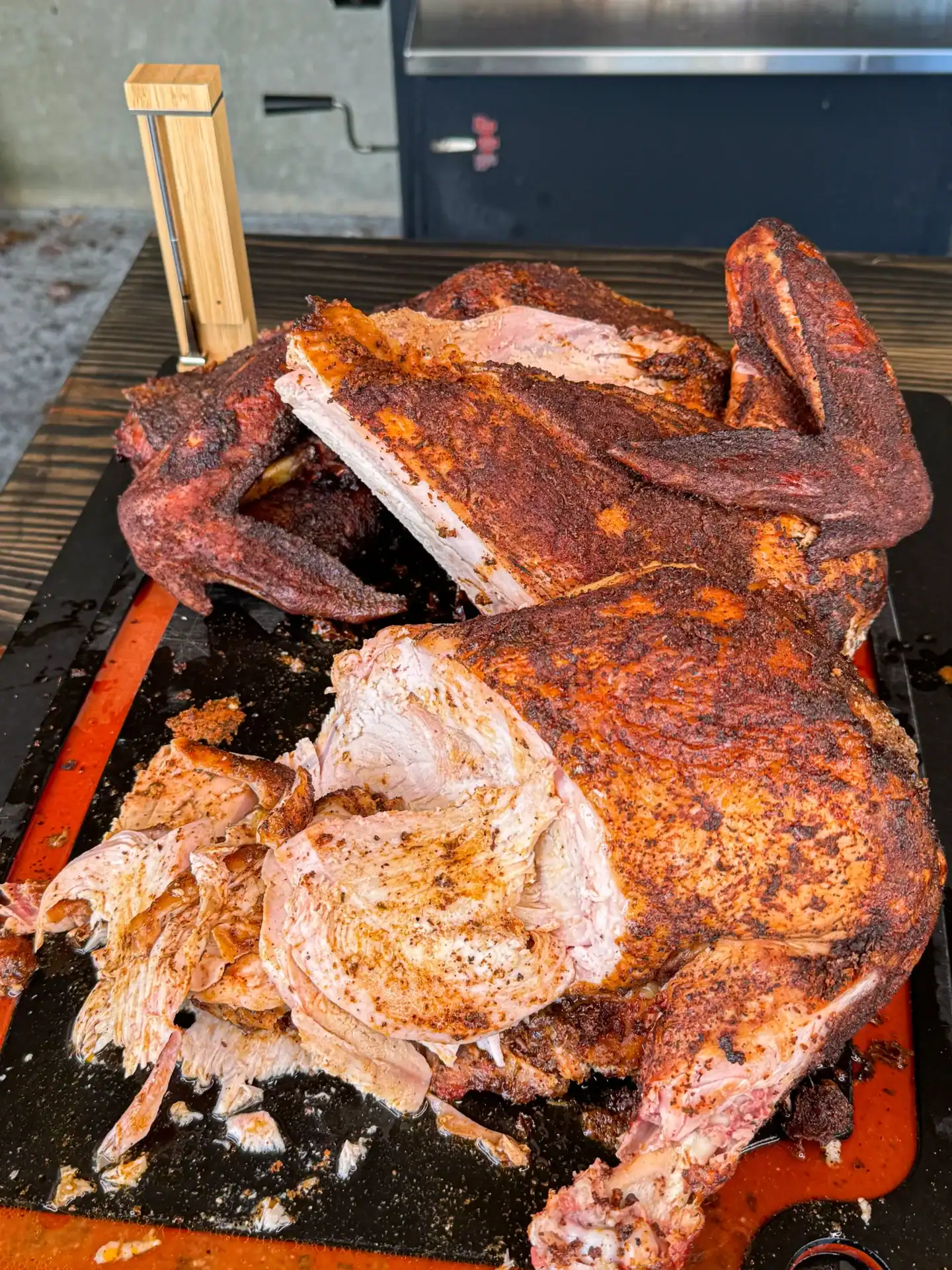 sliced smoked turkey on a cutting board