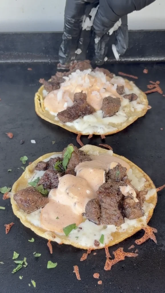 creamy sauce on the steak 