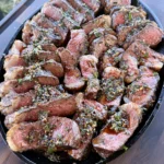 grilled picanha with chili oil on the plate