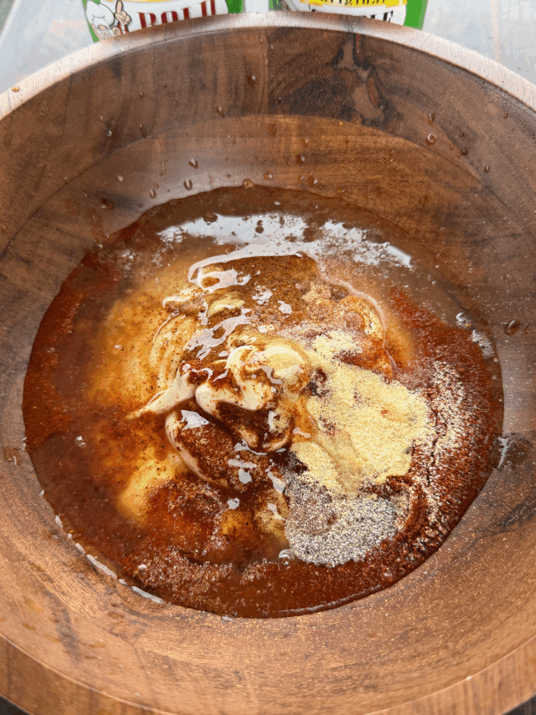creamy sauce in a wooden bowl