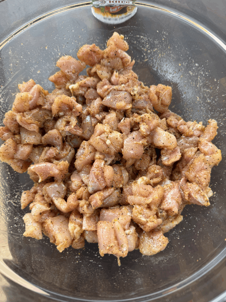 seasoned chicken thighs in a bowl