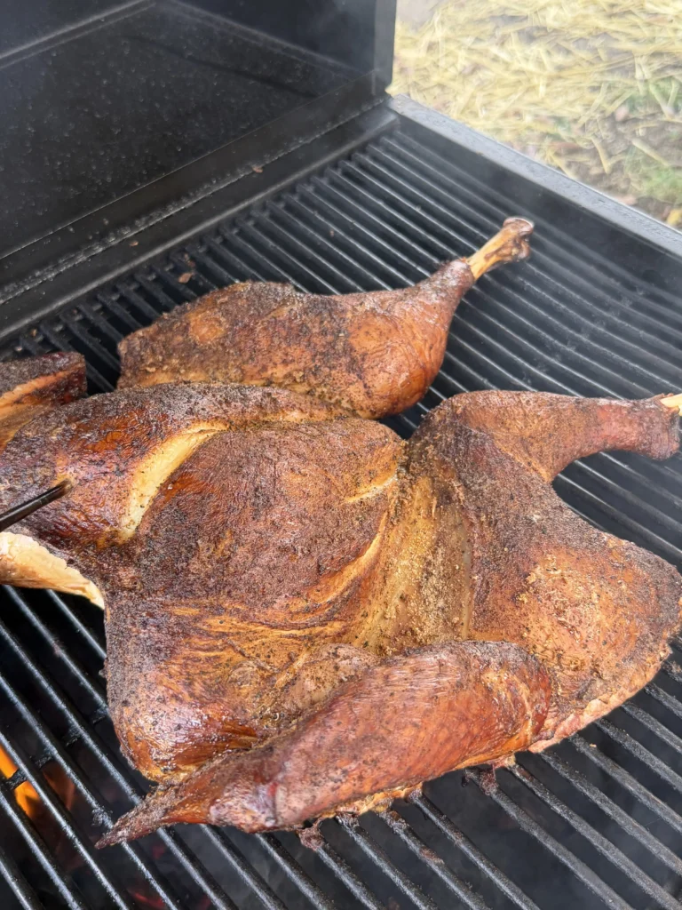 smoked turkey on the charcoal grill