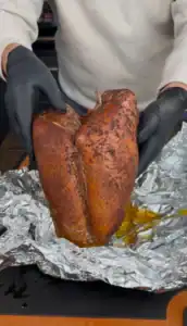 smoked turkey breast about to be wrapped