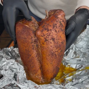smoked turkey breast about to be wrapped