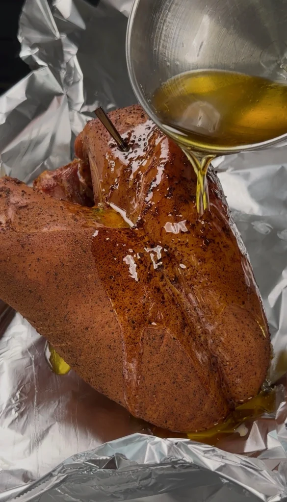 wrapping the turkey breast with ghee