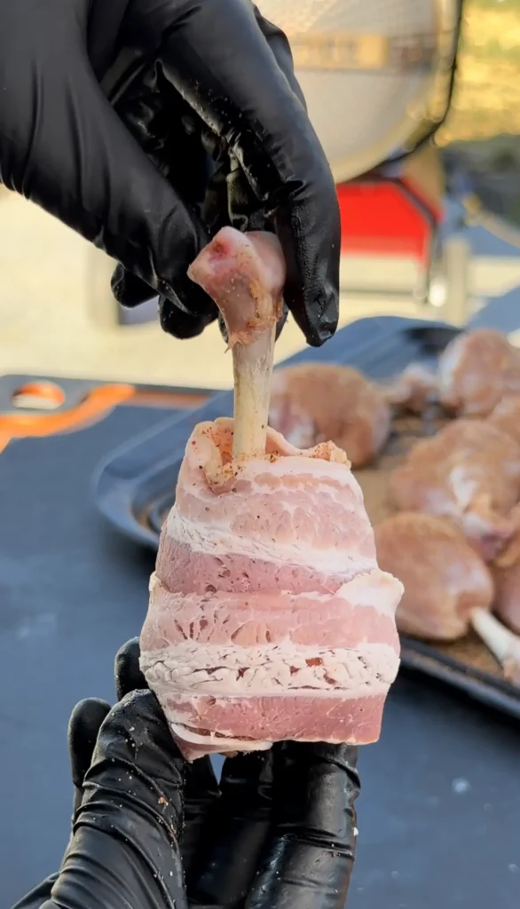 thick cut bacon wrapped around the chicken lollipop