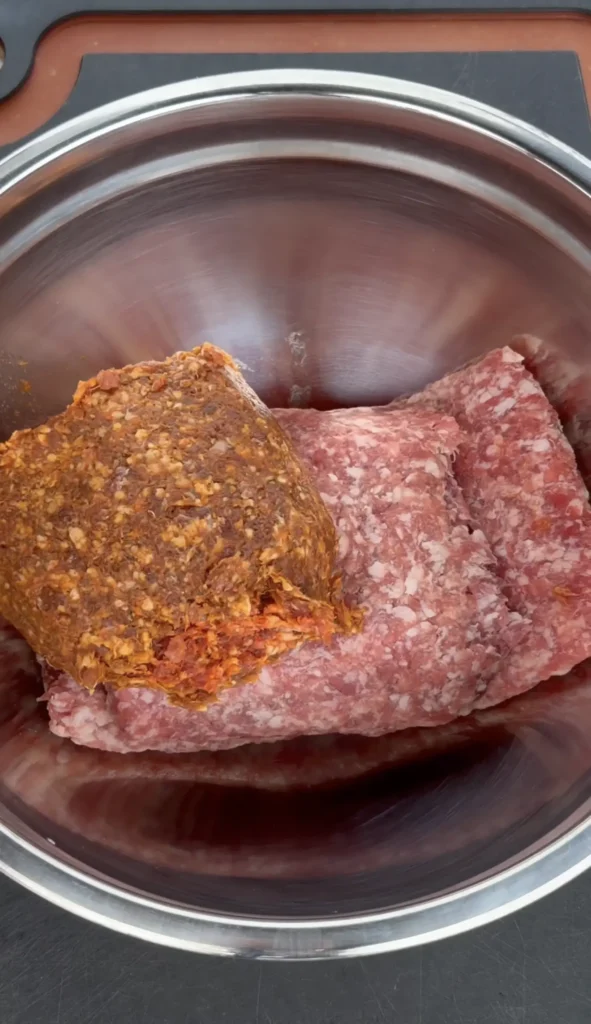 ground pork and chorizo in a bowl