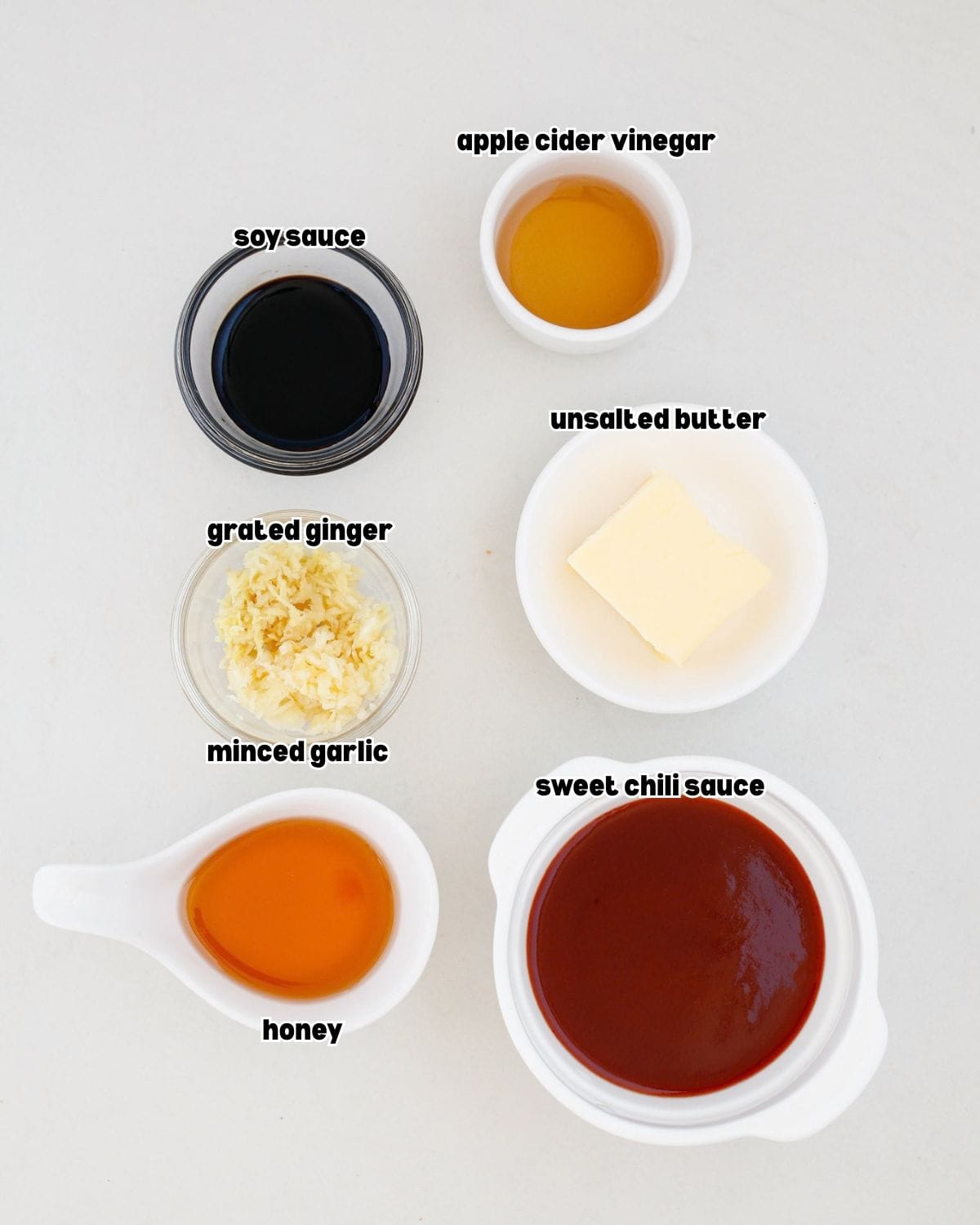 Sweet chili garlic glaze ingredients including sweet chili sauce, honey, soy sauce, garlic, ginger, apple cider vinegar, and butter