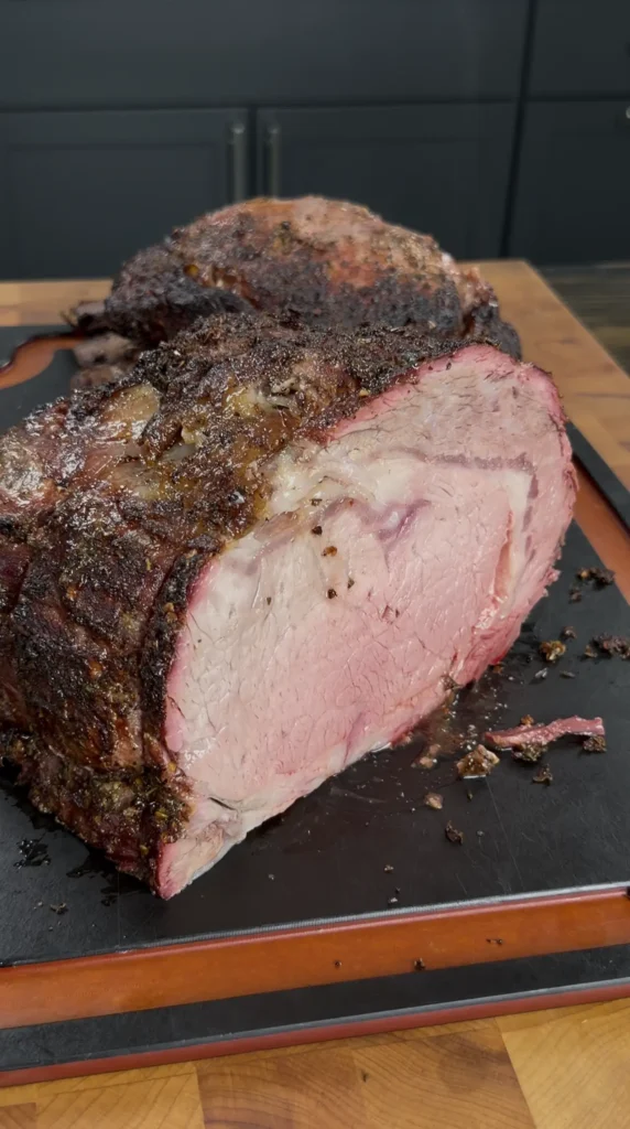 sliced prime rib on the cutting board