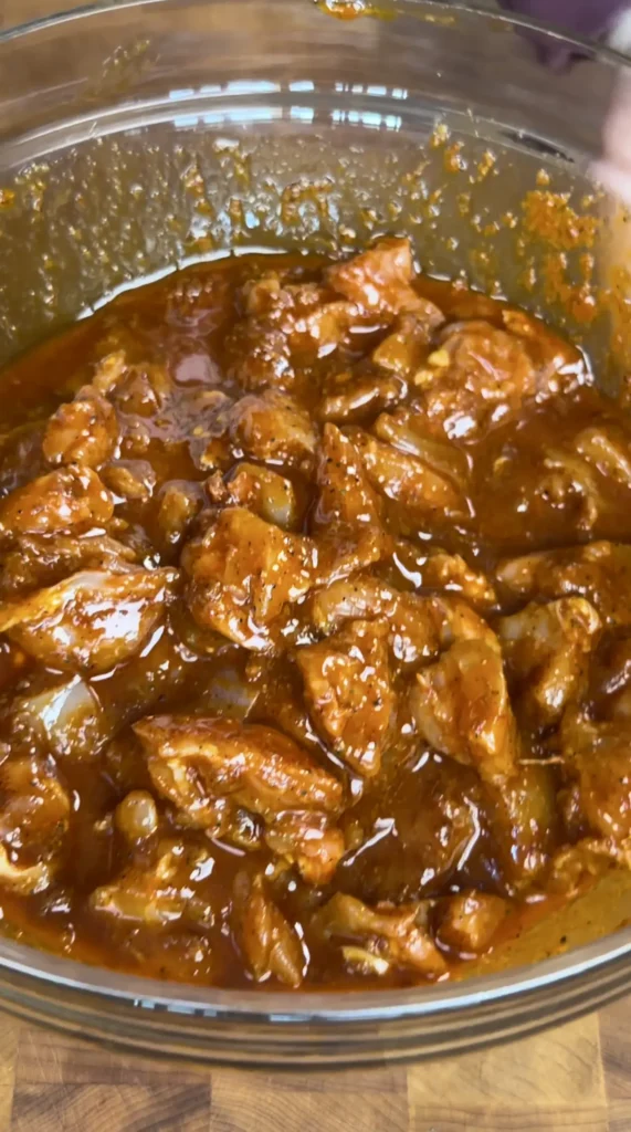 chicken marinade in a bowl with thighs