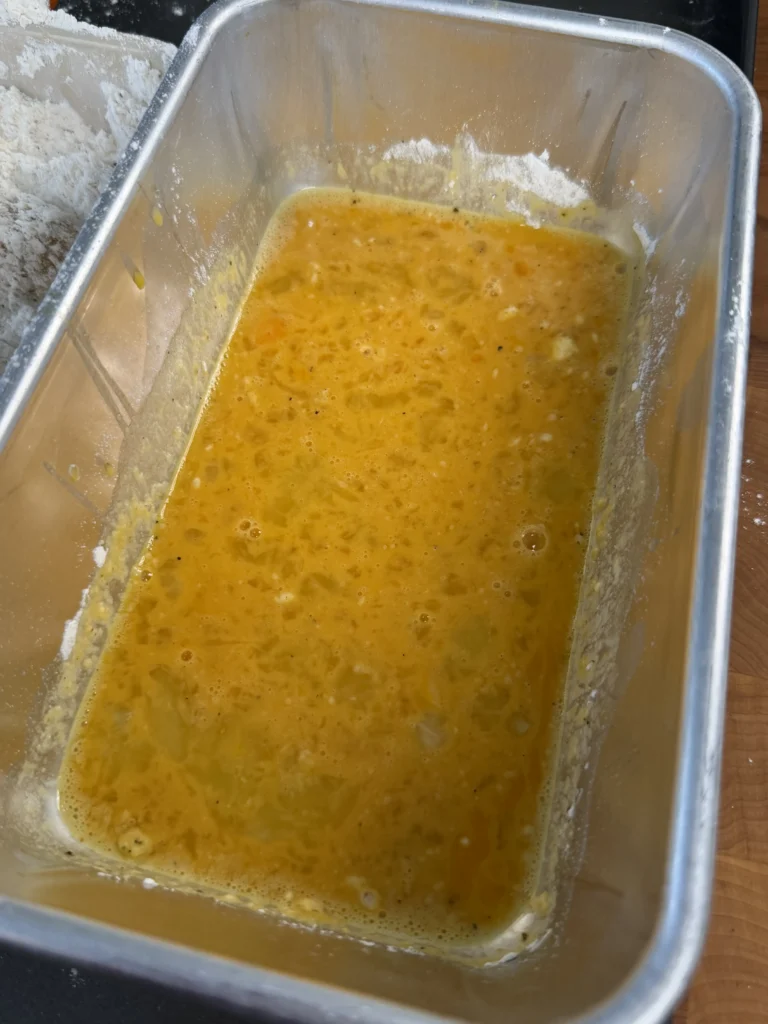 egg wash in the breading station