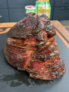 perfectly smoked ham on a cutting board