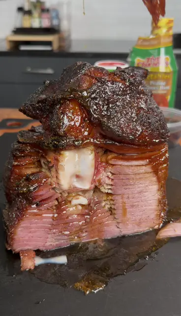 injected ham on a cutting board