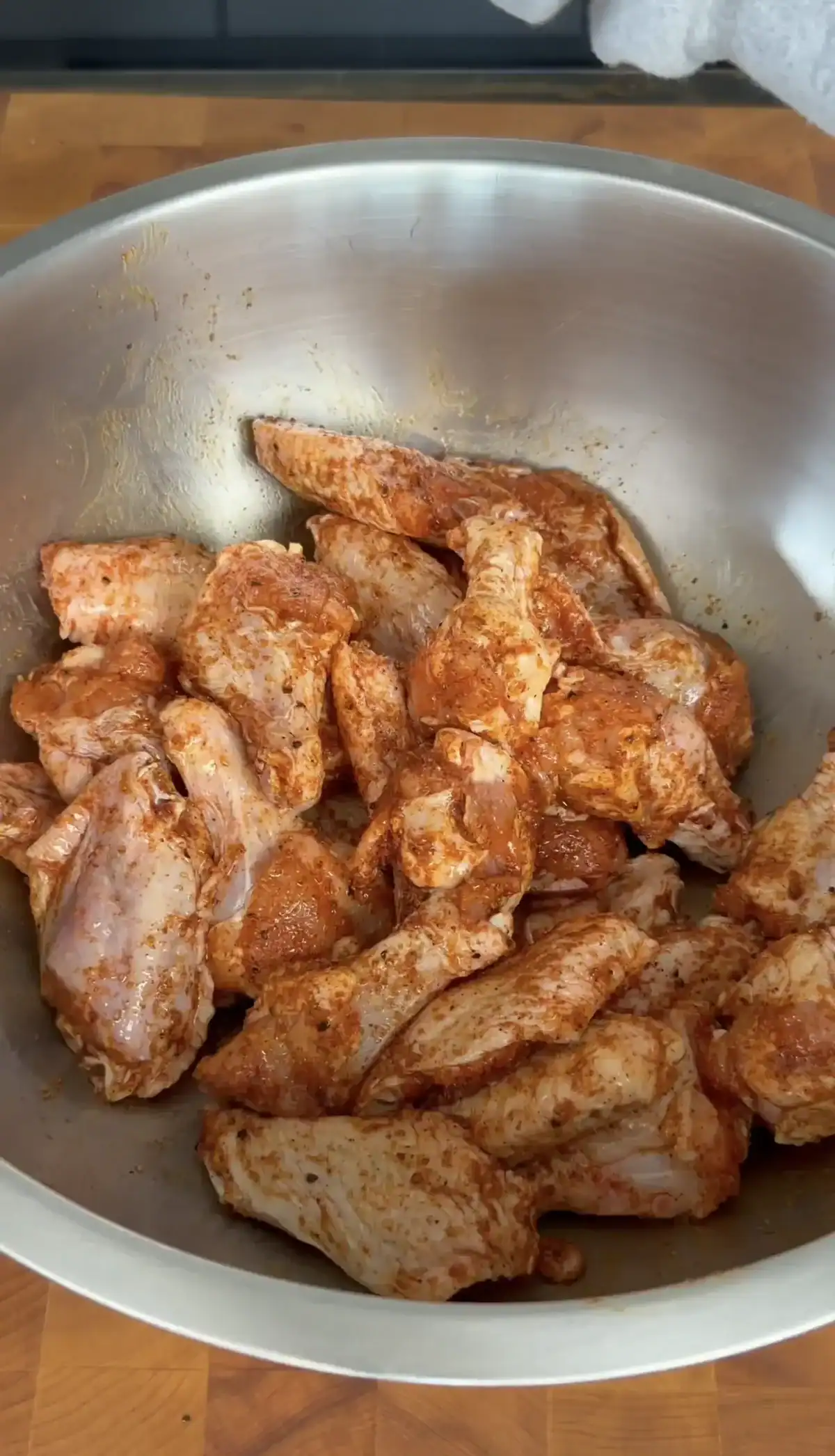 seasoned chicken wings in a bowl