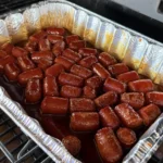 hot dog burnt ends in a pan