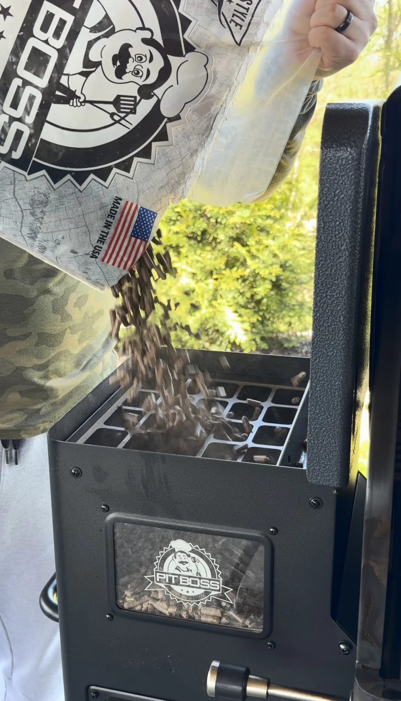 Cast iron skillet of shrimp smoking on a Pit Boss pellet grill