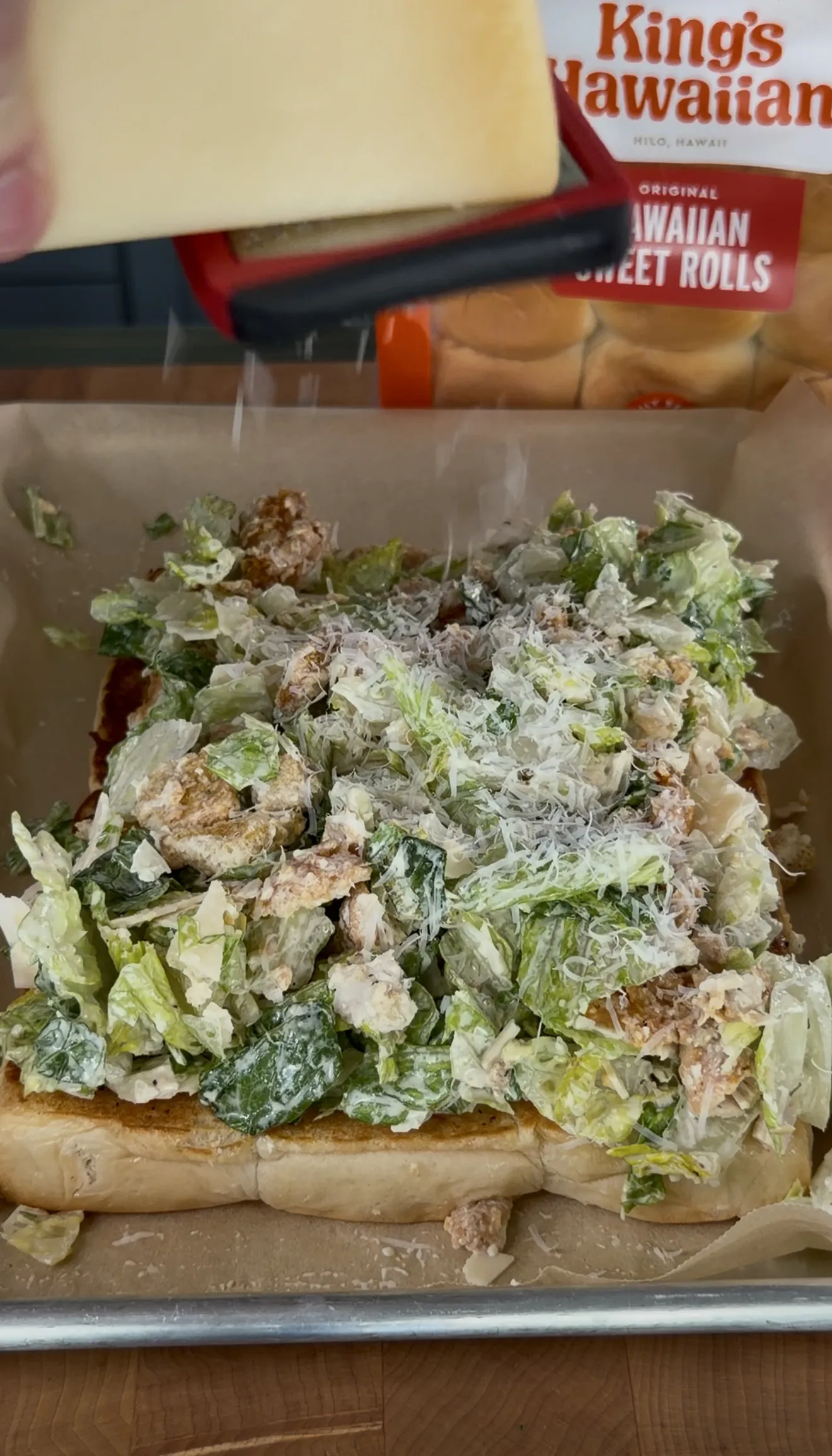 Open-faced crispy chicken caesar slider showing chopped filling