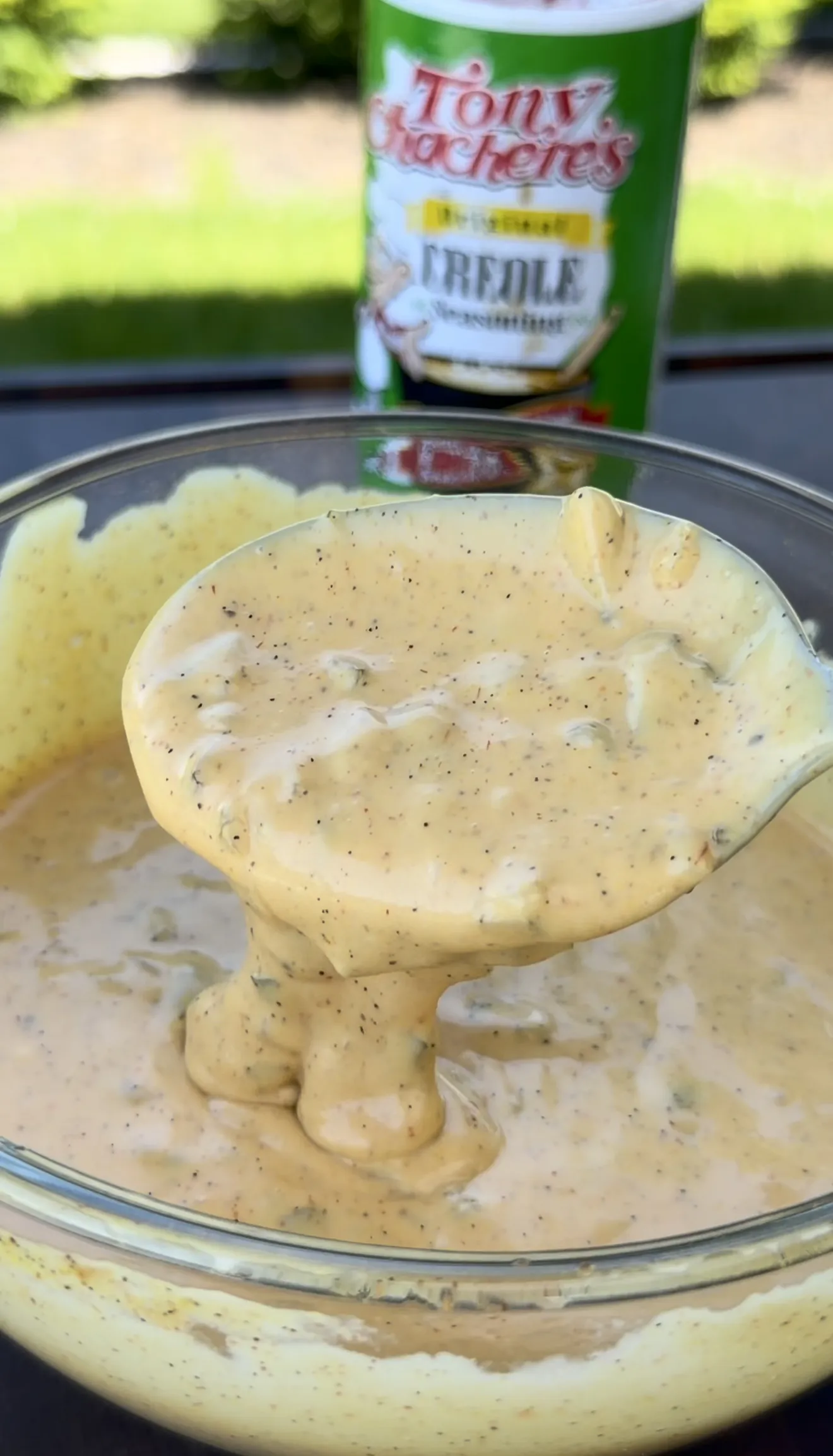 Finished creamy Cajun Creole burger sauce mixed in a glass bowl