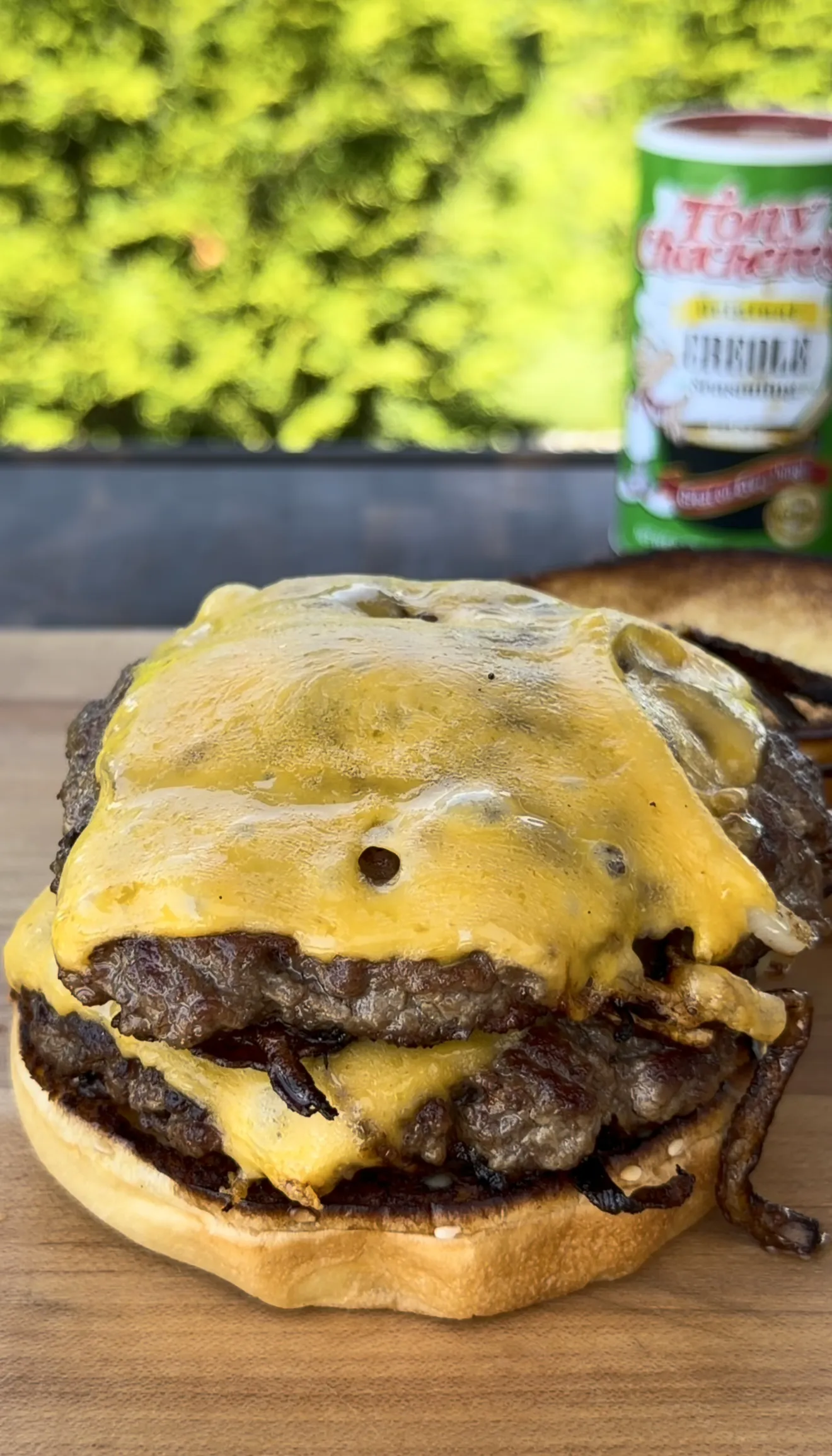 Cajun Oklahoma onion smash burger with melted American cheese and crispy onion crust