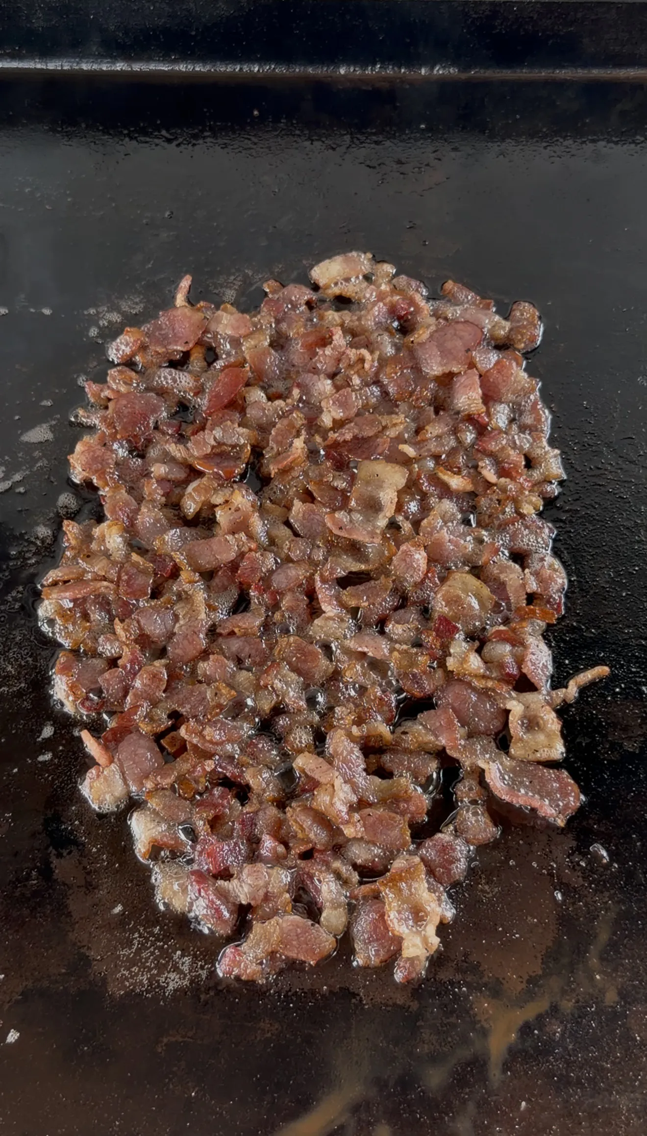Crispy chopped bacon sizzling in rendered fat for the Loaded Baconnaise Sauce