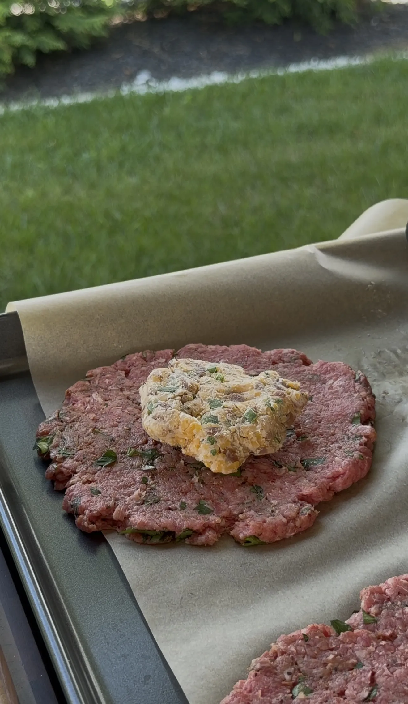 Thin patty topped with bacon ranch cheese filling before sealing