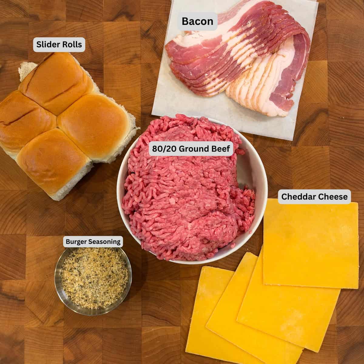 Ingredients for bacon cheeseburger sliders with ground beef, bacon, cheddar cheese, and slider rolls