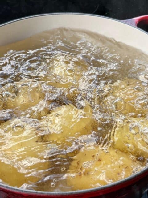 Yukon Gold Potatoes boiling in salted water for Cajun potato croquettes