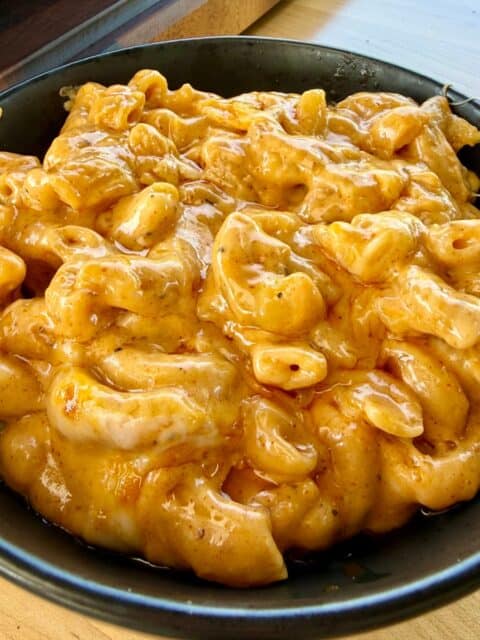 No-Bake Smoked Mac and Cheese served in a bowl with creamy cheese sauce