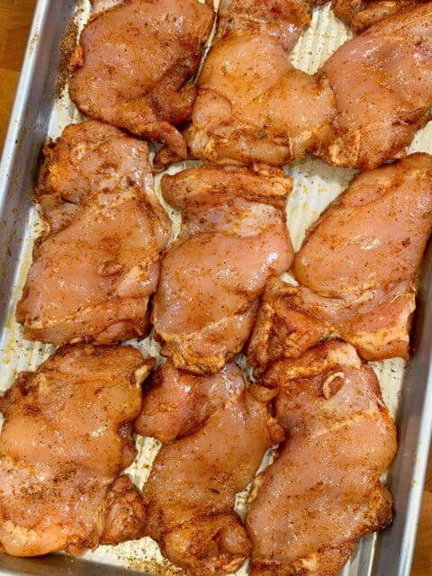Chicken thighs seasoned with Cajun seasoning, smoked paprika, garlic powder, and black pepper